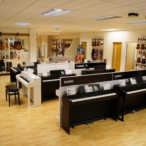 Our top floor is full of Pianos, Acoustic Guitars, Ukuleles, Banjos, Brass and Woodwind and more!