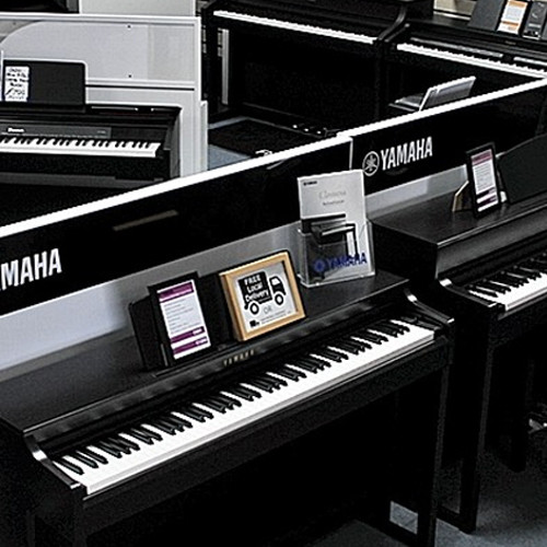 Huge piano showroom, with Digital Pianos from Yamaha, Roland and Casio.